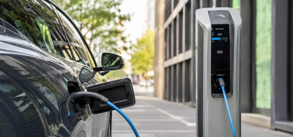 Electric car at a charging station Electric car at a charging station
